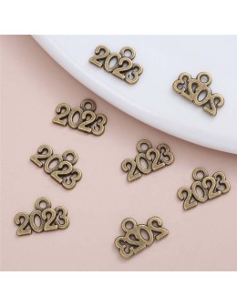 Μεταλλικό γούρι Antique Bronze 14x9mm "2023" 1τεμ